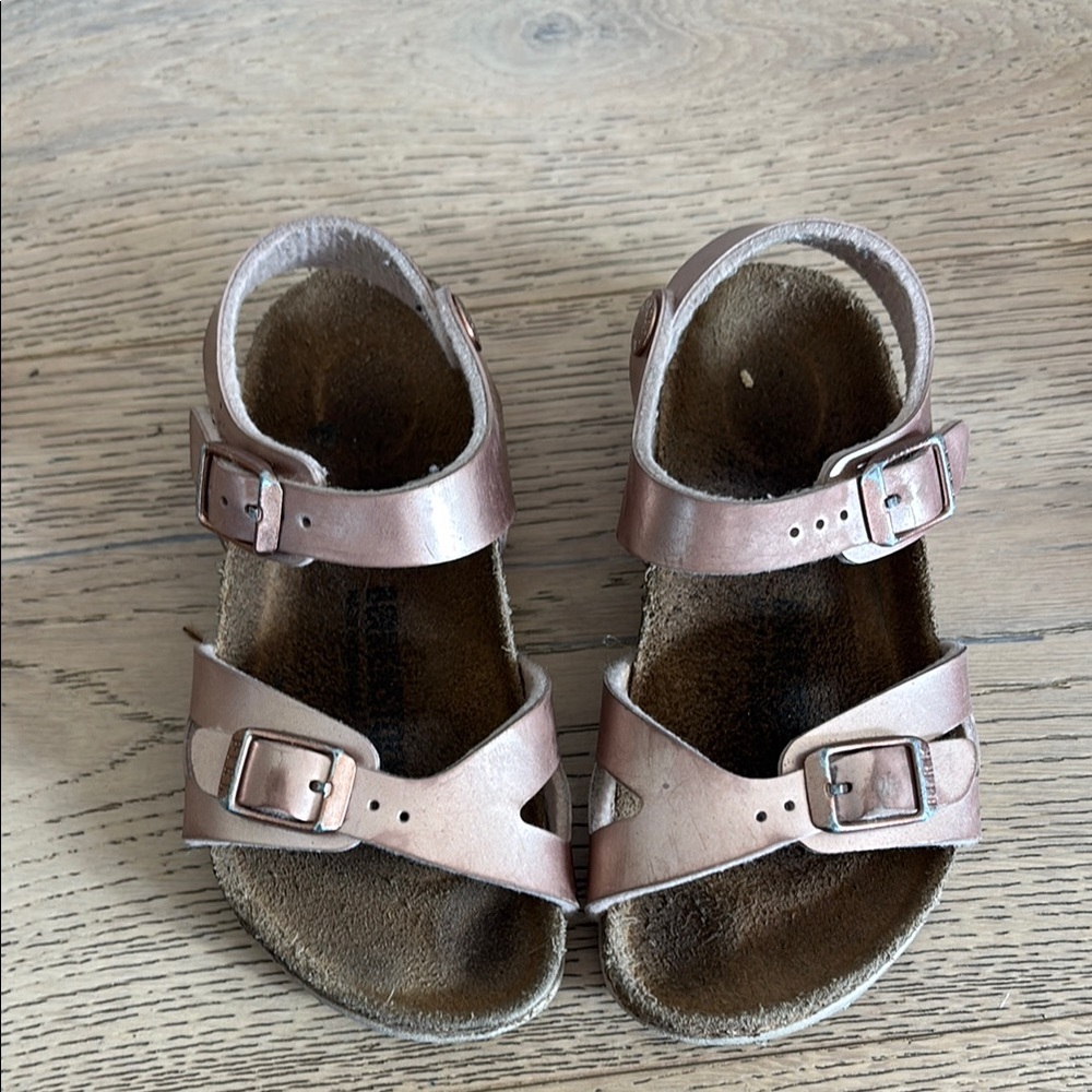 Birkenstock Pink Sandals with Adjustable Straps and Contoured Footbed
